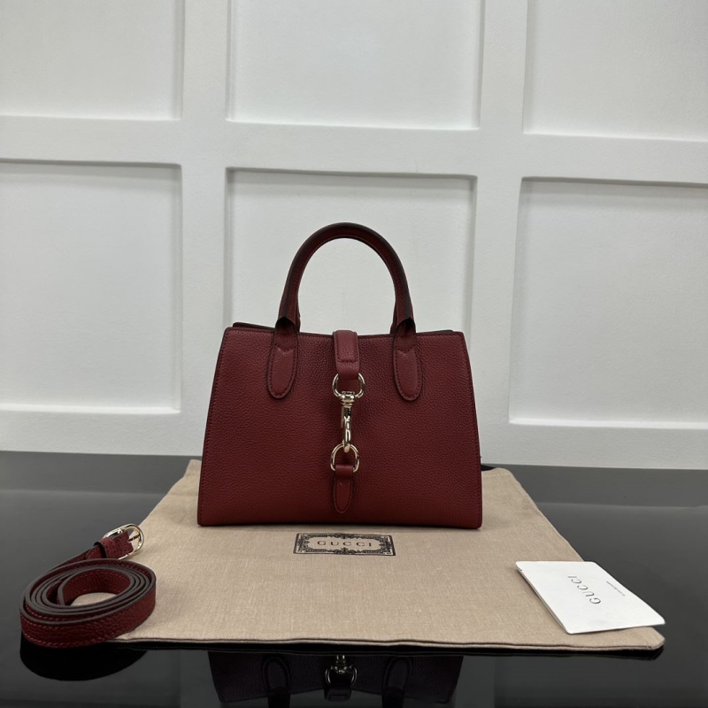 G*u*i top handle bags